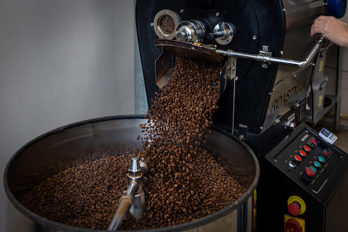 Femili PNG Coffee beans being roasted at Niugini Arabica's Duffy cafe.
