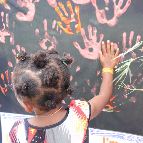 One of many children who participated in the ‘stop violence’ hand painting activities during 67th Goroka Show in Goroka, Eastern Highlands Province.